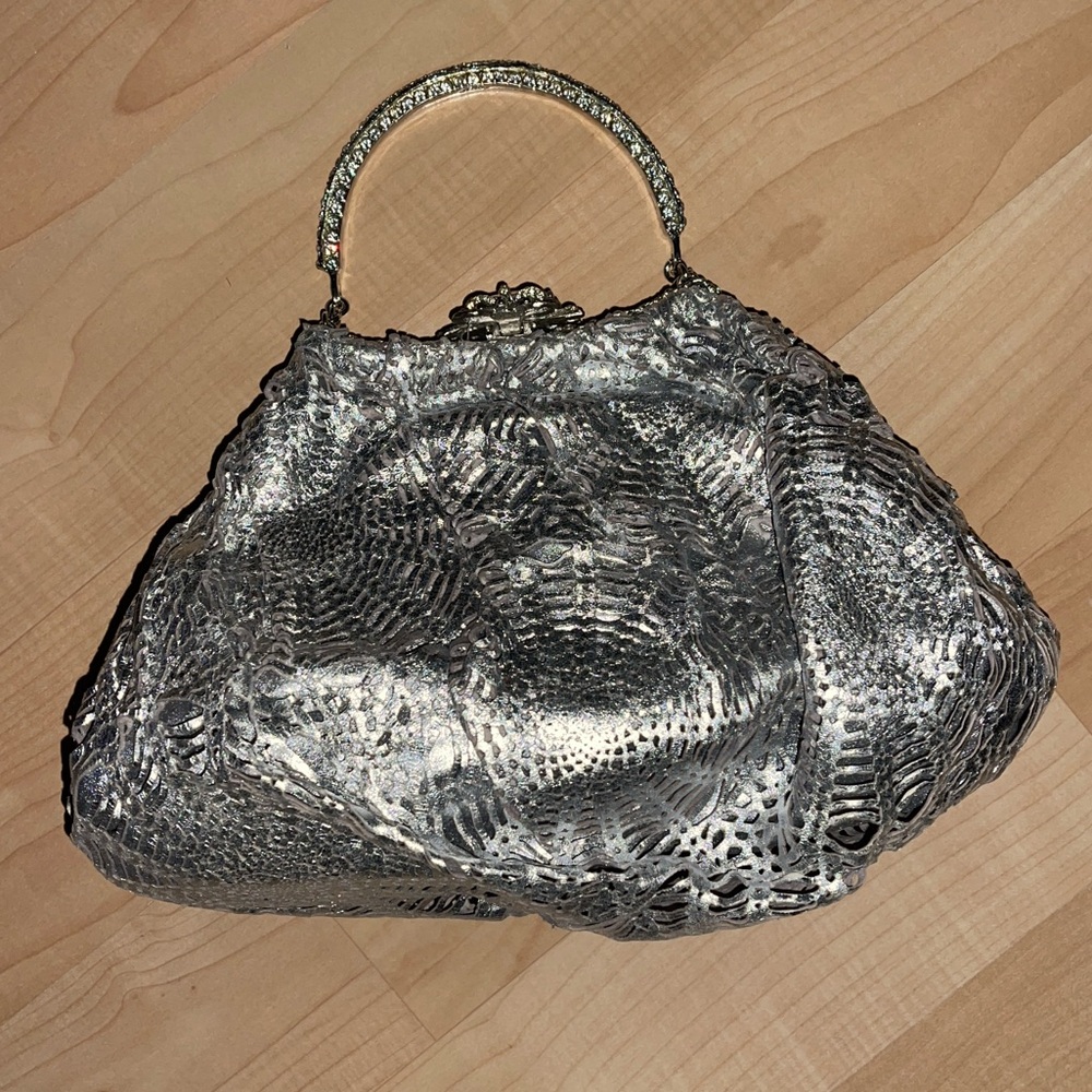 Clara kasavina silver spider web bag